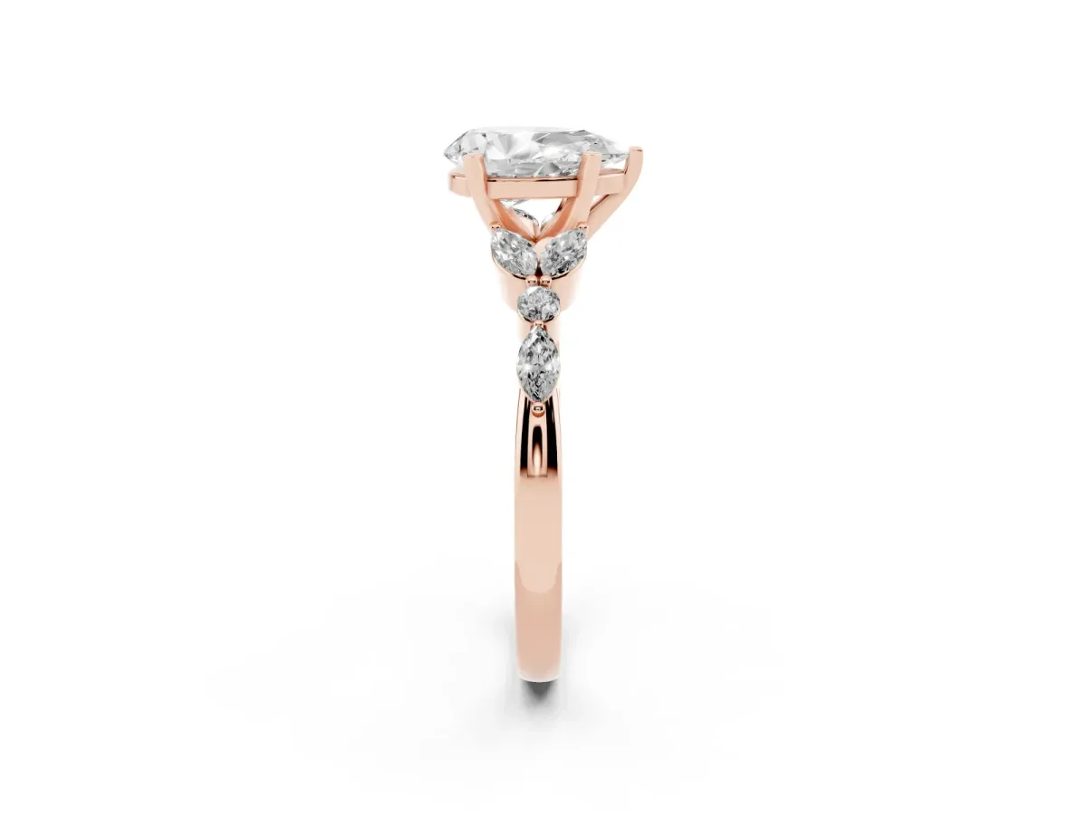 Pear Cut Diamond Solitaire Ring with Side Stones and Four-Prong Setting Rose gold