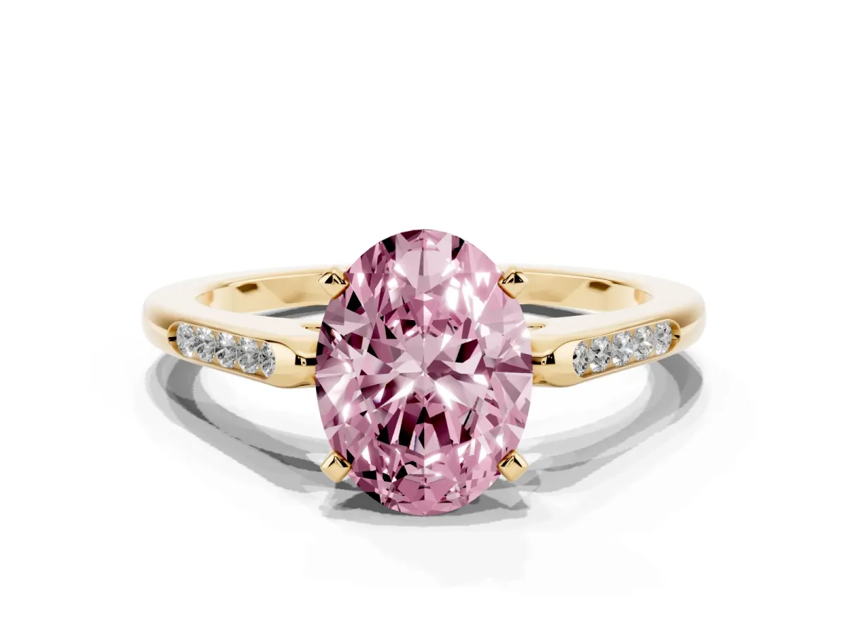 Fancy Pink Oval Cut Diamond Solitaire Ring with Channel Set Round Band and Prong Setting Yellow gold