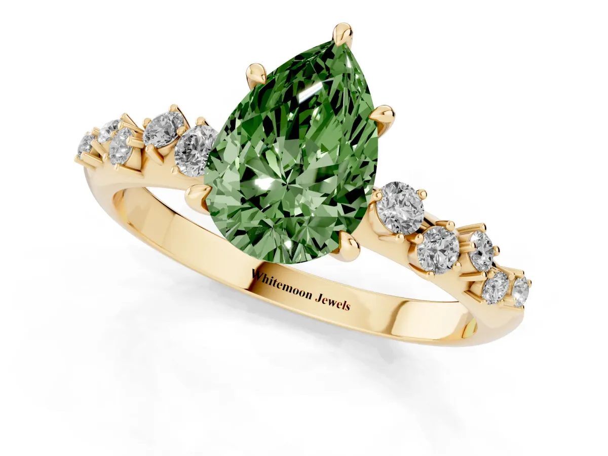 Fancy Green Pear Cut Diamond Cluster Side Stone Solitaire Ring with Prong Setting Yellow gold