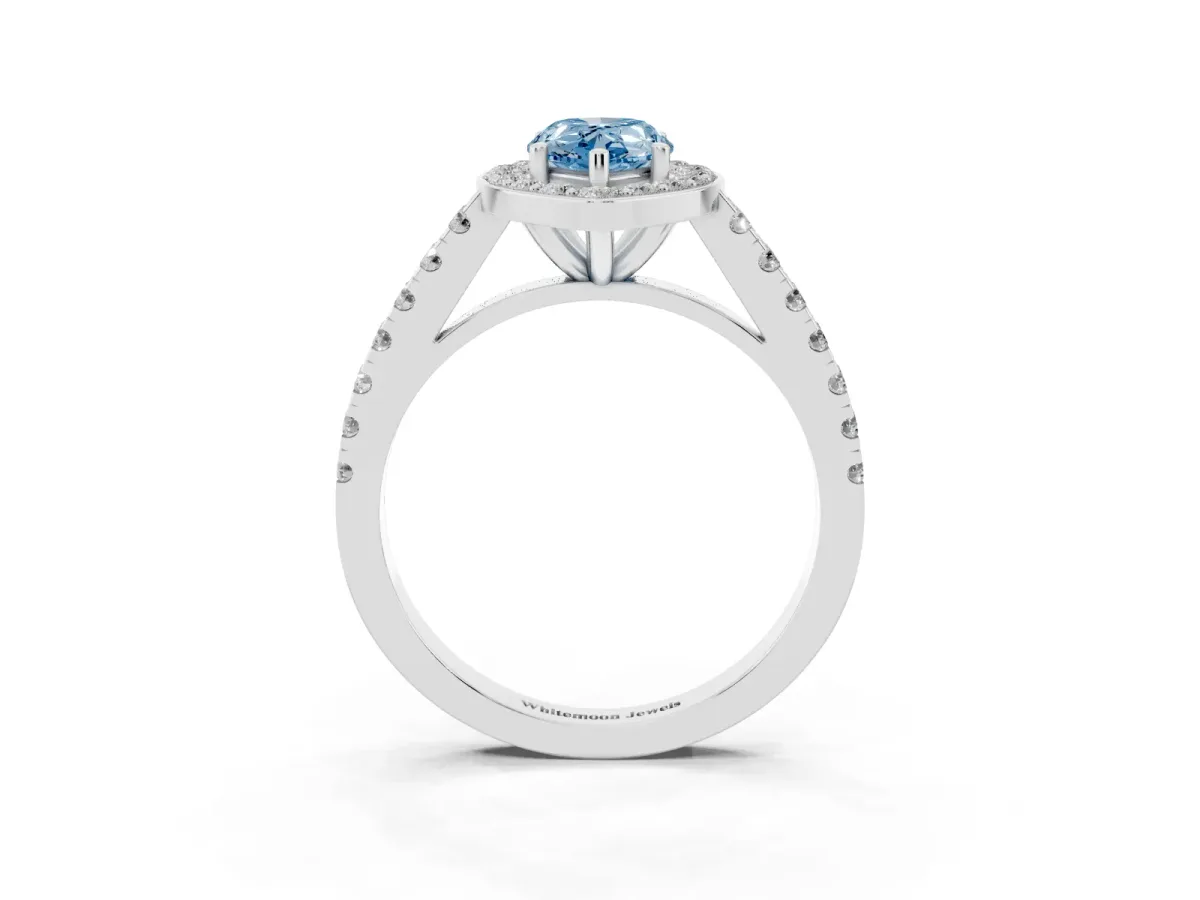 Fancy Blue Pear Cut Diamond Halo Ring with Round Pavé Split Shank and Prong Setting Platinum