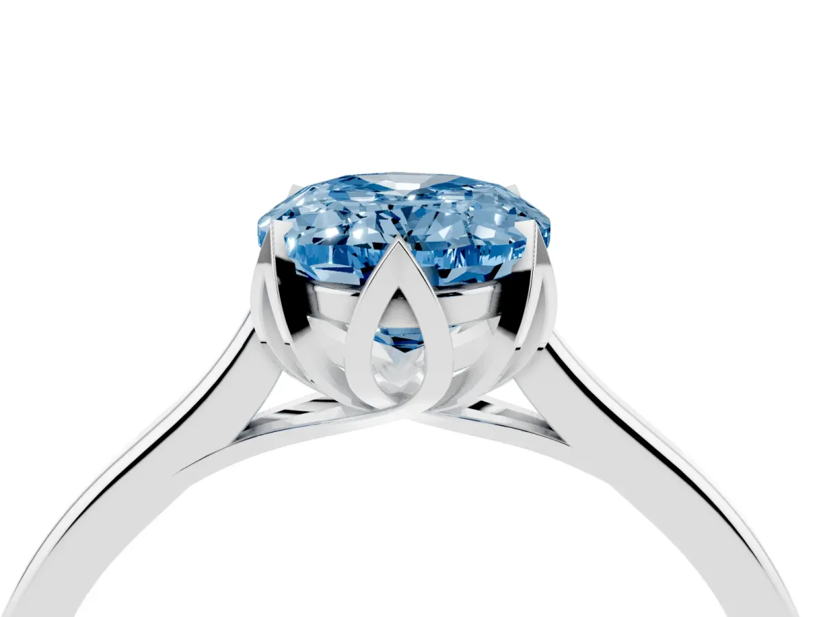 Fancy Blue Oval Cut Diamond Solitaire Ring with Flower Prong Setting and Classic Band Silver