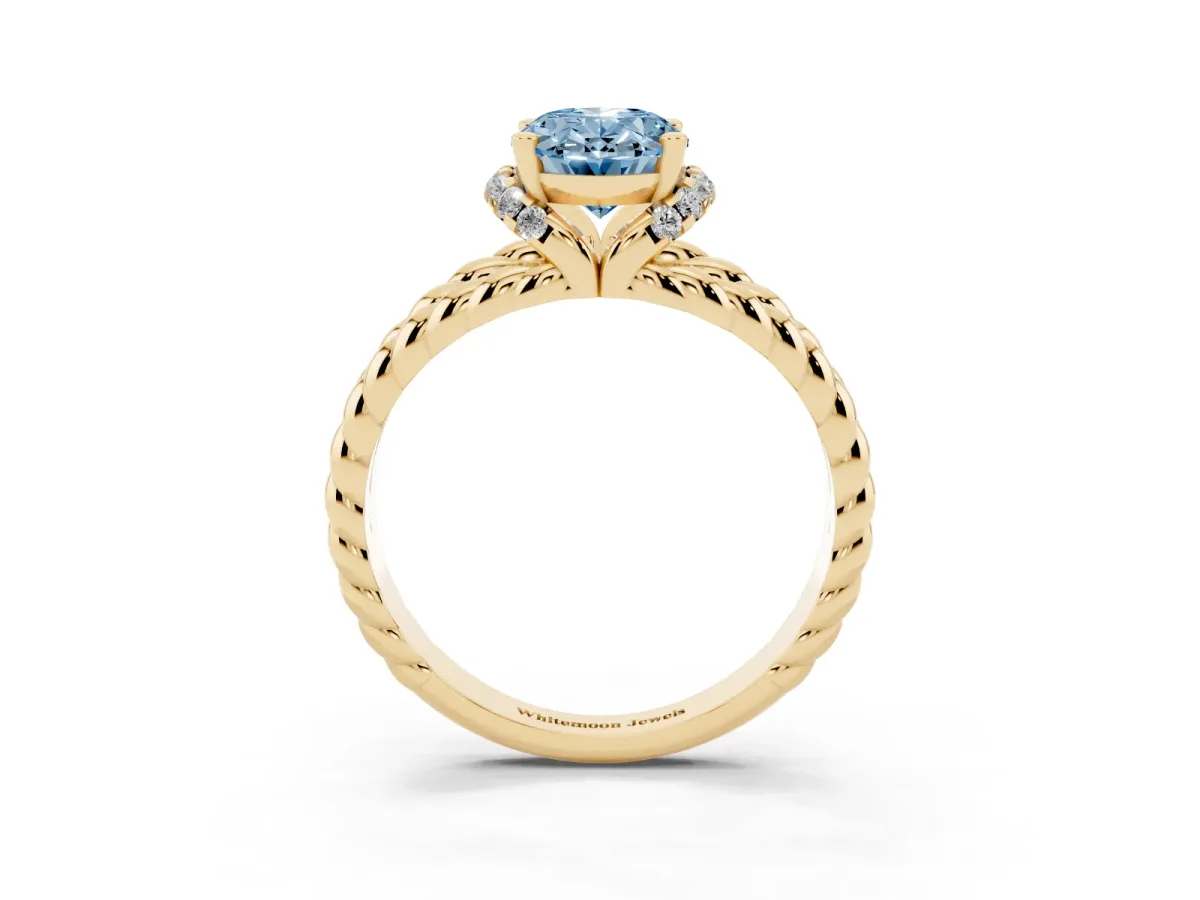 Fancy Blue Oval Cut Halo Twisted Band Four-Prong Ring Yellow gold
