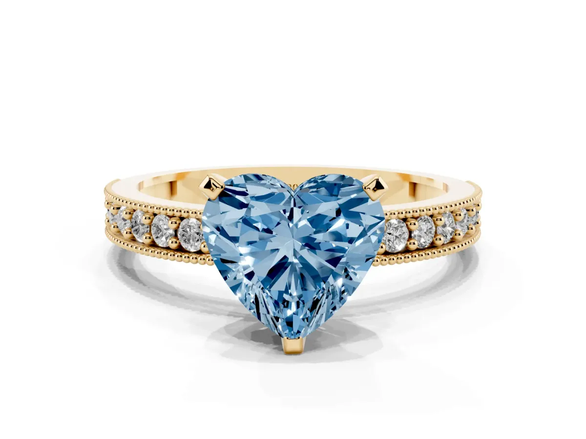 Fancy Blue Heart Cut Diamond Milgrain Pavé Engagement Ring with Four-Prong Setting Yellow gold