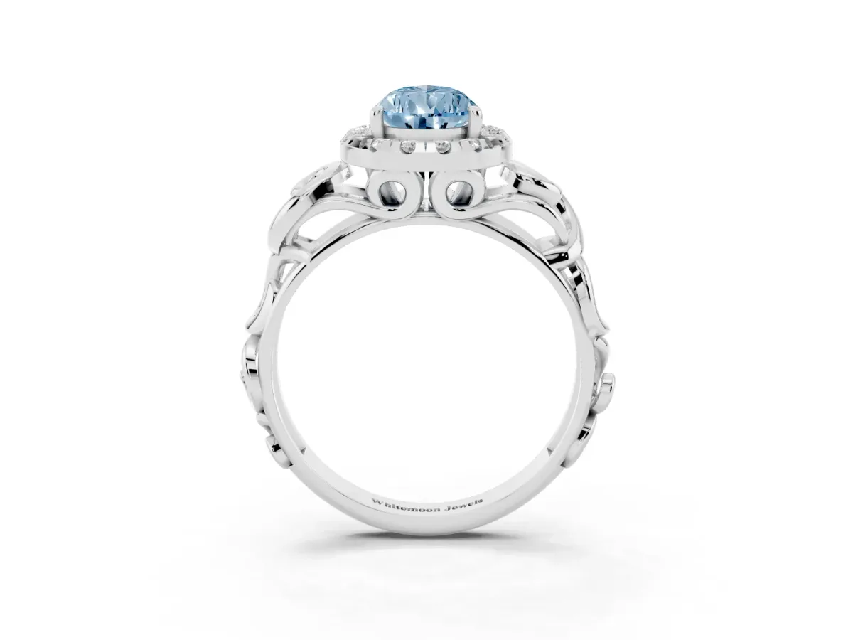 Fancy Blue Pear Cut Cut Halo Diamond Ring with Scrollwork Band and Four-Prong Setting Silver