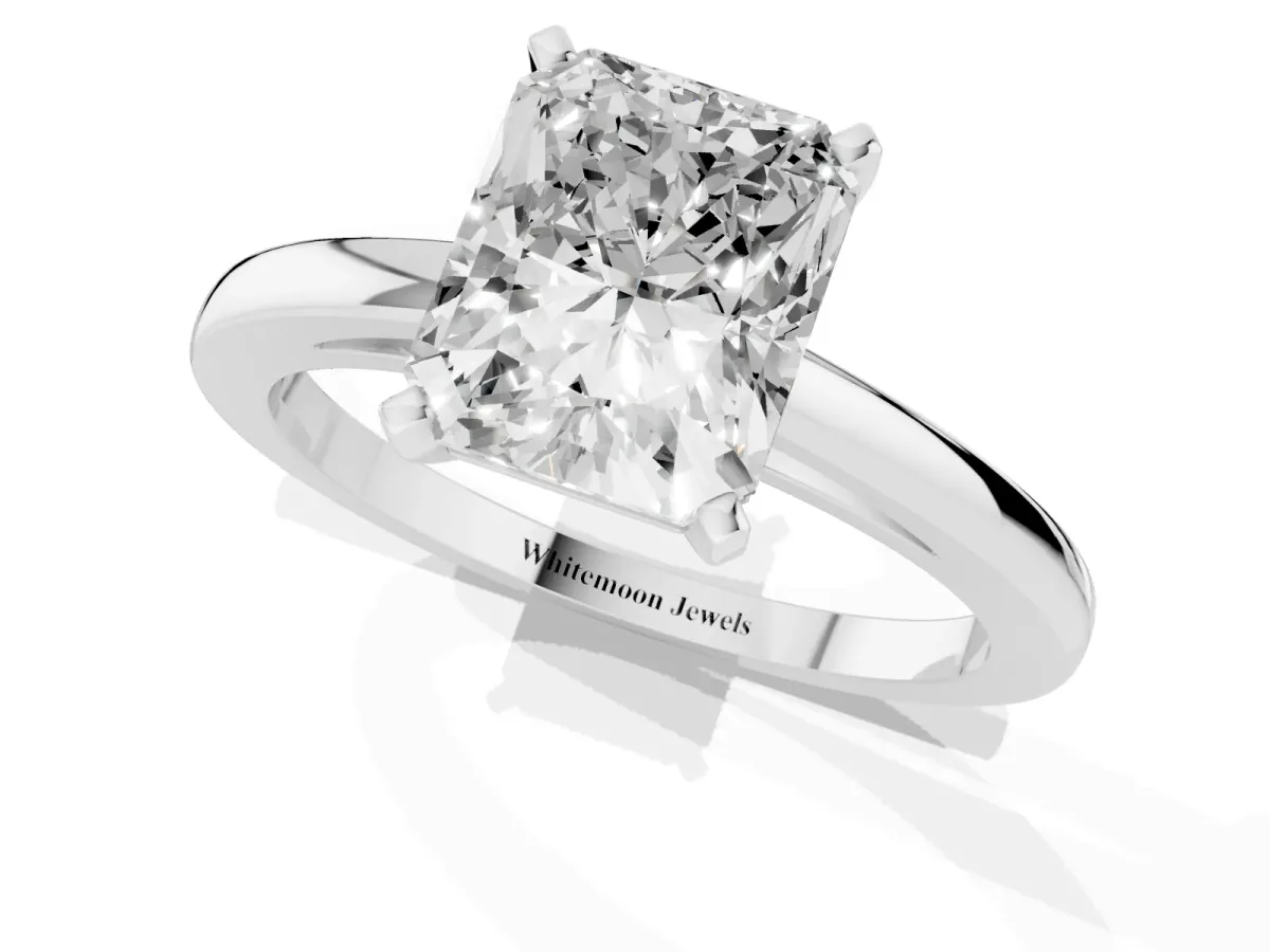 Radiant Cut Solitaire Diamond Engagement Ring with Four-Prong Setting on a Classic Band Silver