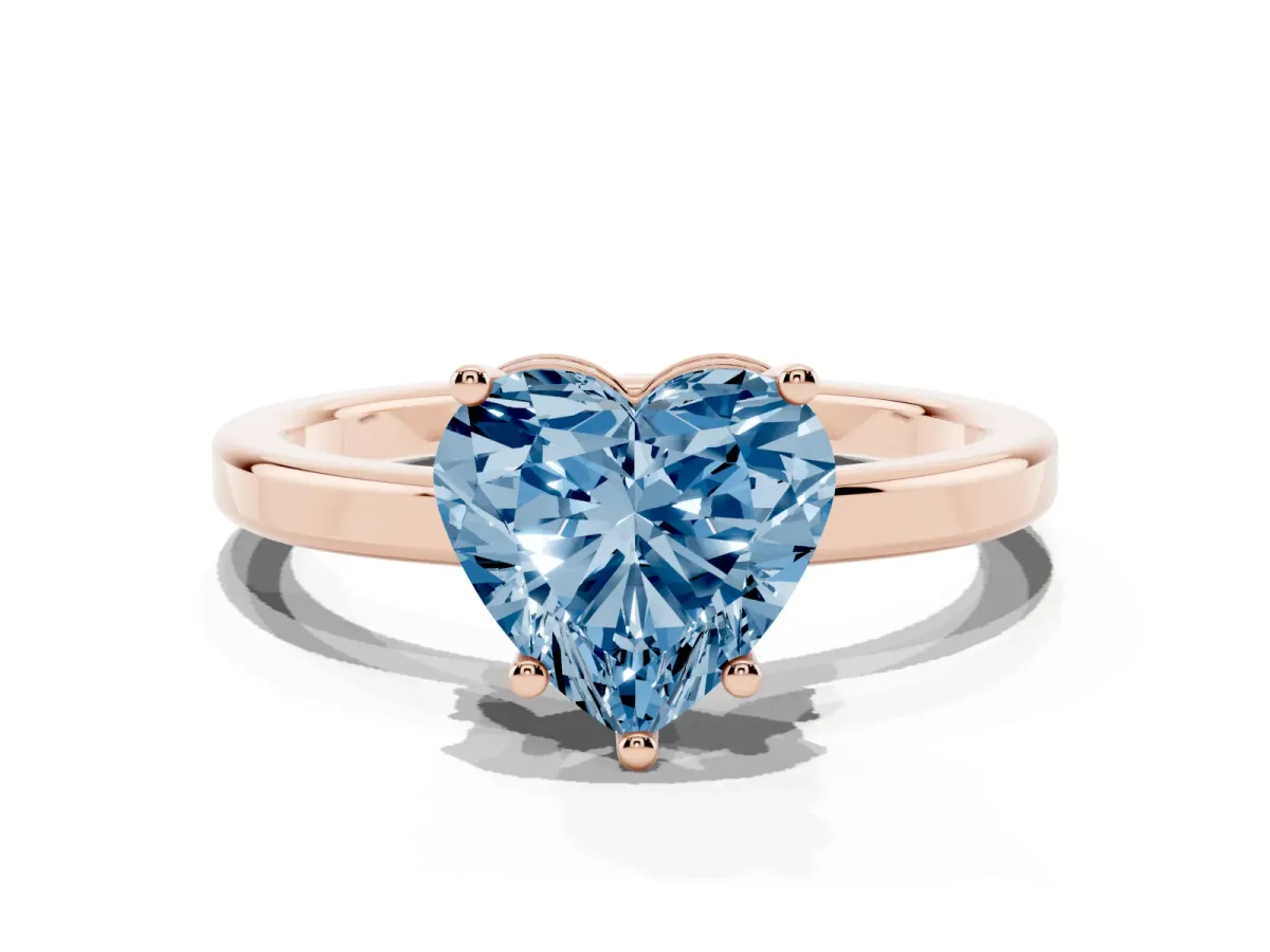 Fancy Blue Heart Cut Cut Solitaire Engagement Ring with Four-Prong Setting on a Classic Band Rose gold
