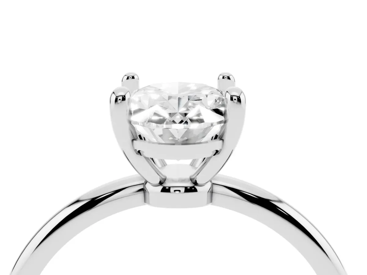 Oval Cut Solitaire Diamond Ring with 4-Prong Setting on a Classic Band Silver
