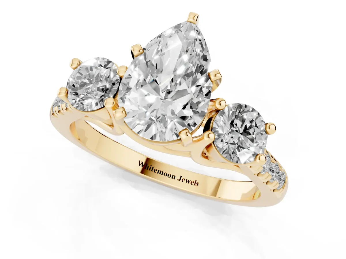 Three-Stone Pear Cut Diamond Pavé Band with Four-Prong Setting Yellow gold