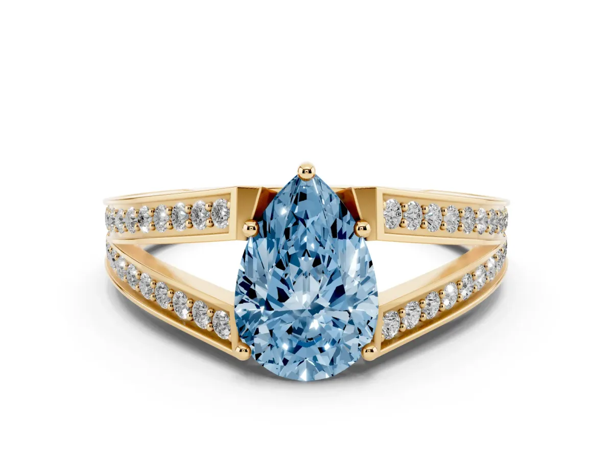 Fancy Blue Pear Cut Diamond Split Shank Ring with Pavé Band and Four-Prong Setting Yellow gold