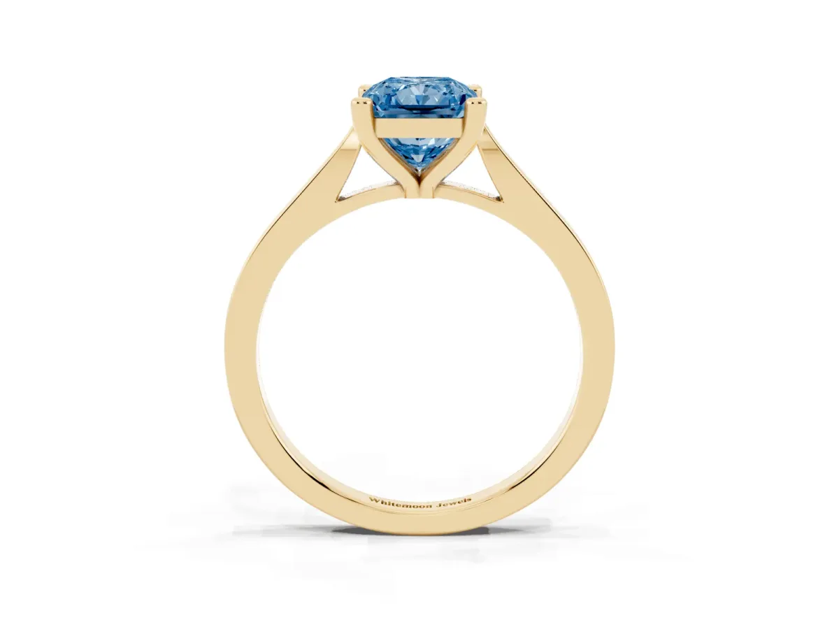 Fancy Blue Radiant Cut Solitaire Diamond Ring with Four-Prong Setting and Tapered Band Yellow gold