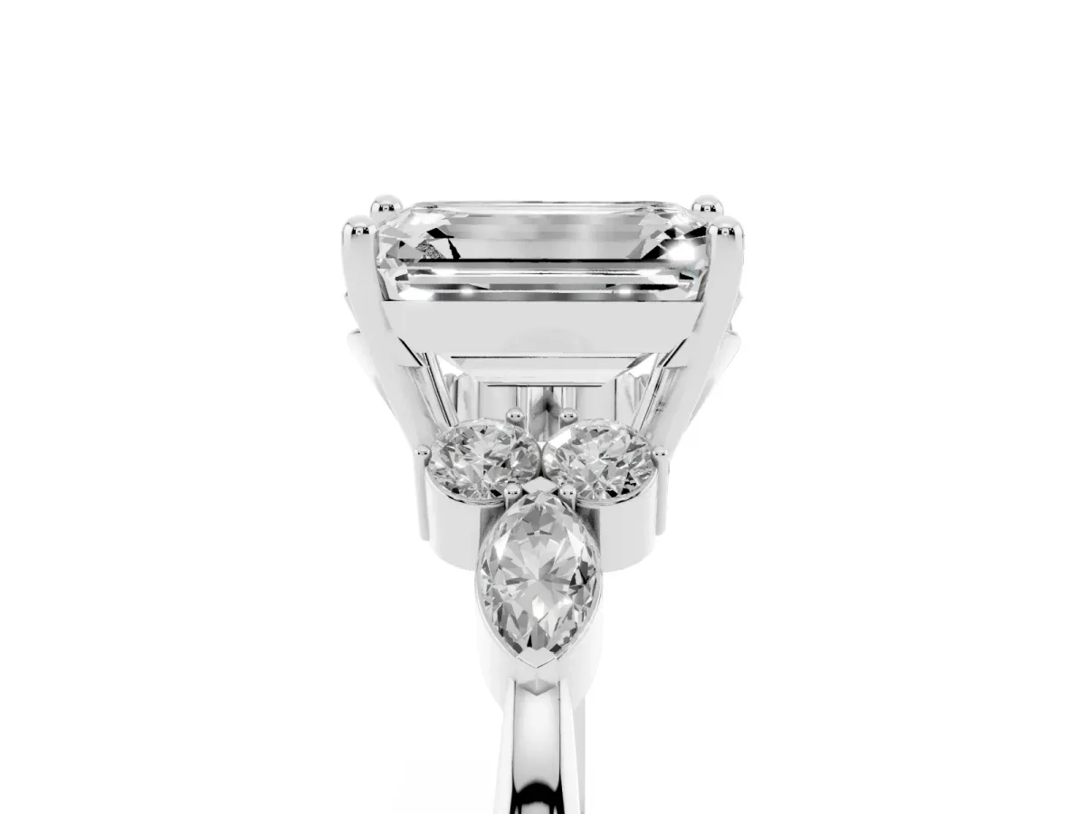 Emerald Cut Brilliant Diamond Solitaire Ring with Pear Side Stones and Four-Prong Setting Silver