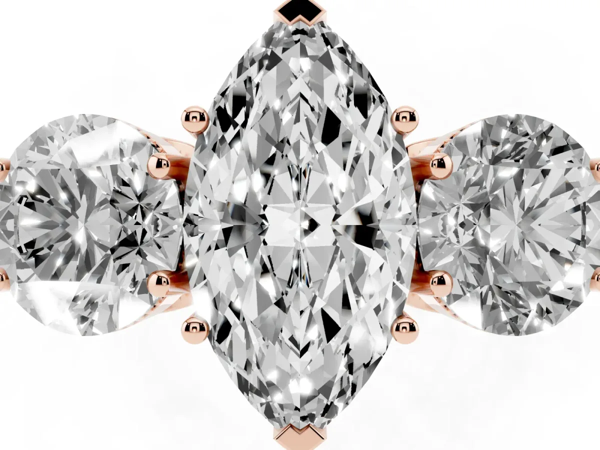 Three-Stone Marquise Cut Diamond Engagement Ring with Prong Setting on a Classic Band Rose gold
