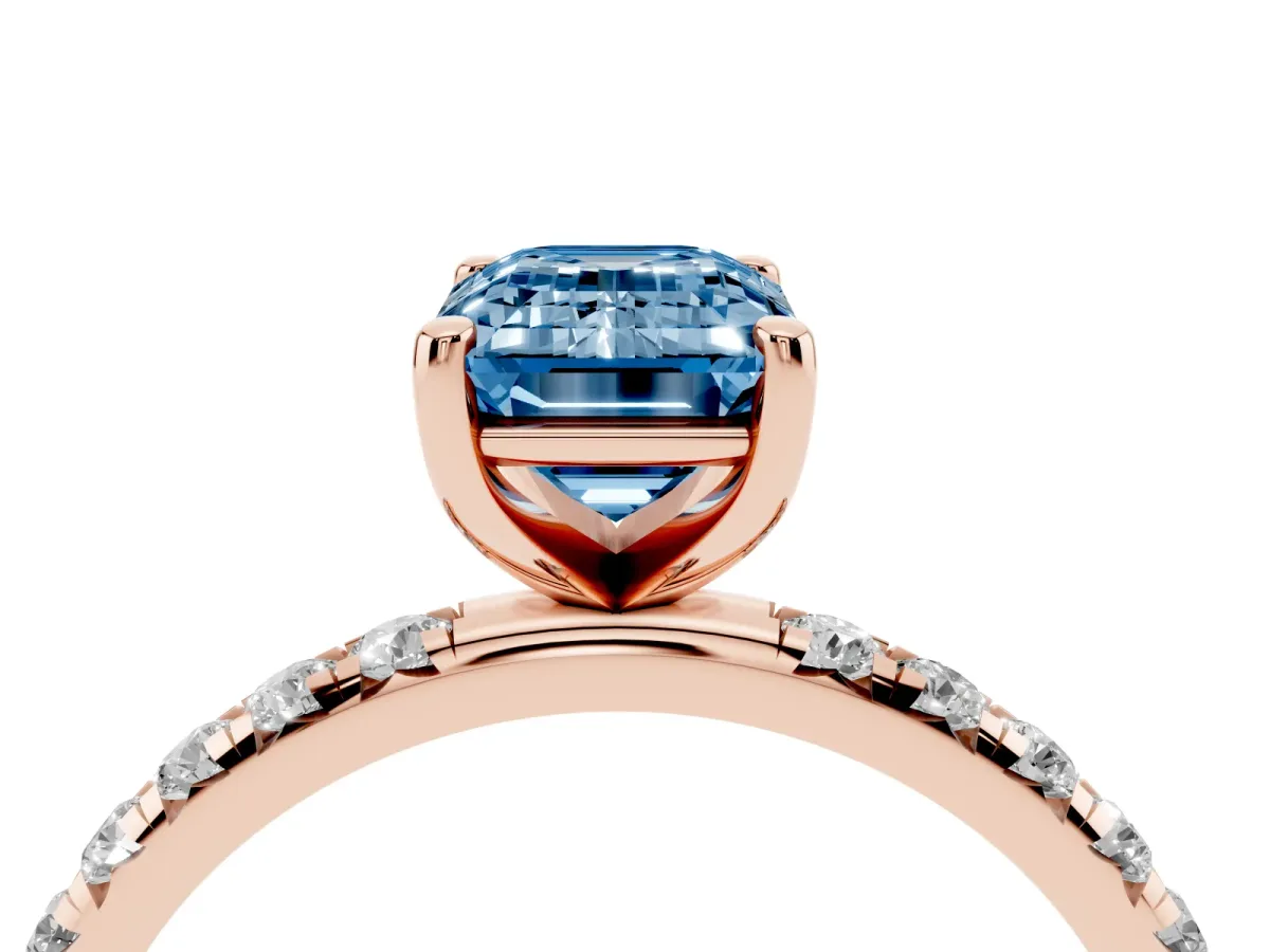Fancy Blue Emerald Cut Cut Diamond Solitaire Ring with Micro Pave Band and Four Prong Setting Rose gold