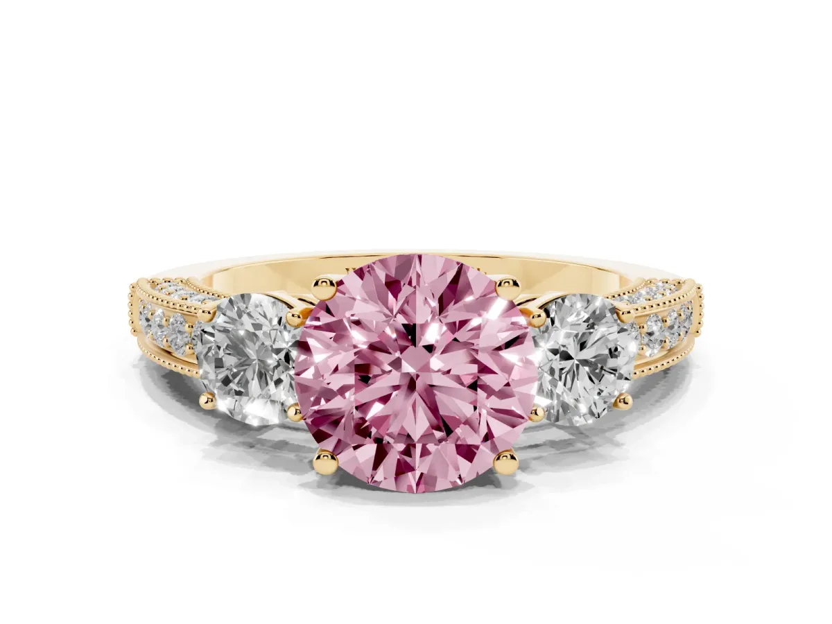 Fancy Pink Round Cut Three-Stone Diamond Ring with Pavé Band and Four-Prong Setting Yellow gold