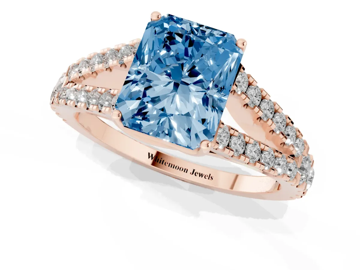 Fancy Blue Radiant Cut Diamond Split Shank Engagement Ring with Round Pavé and Prong Setting Rose gold