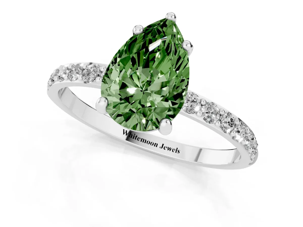 Fancy Green Pear Cut Diamond Solitaire Ring with Round Pavé Band and Prong Setting Platinum
