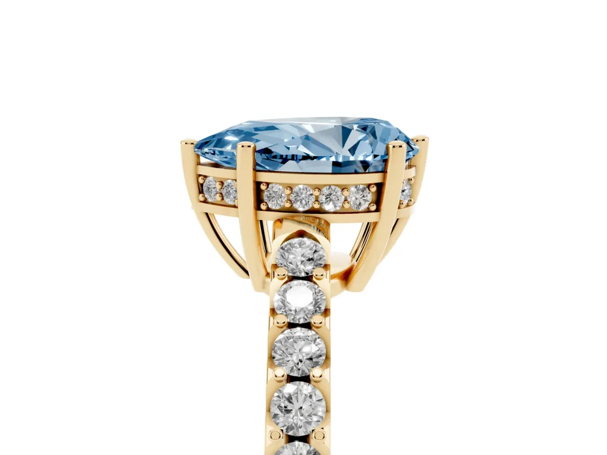 Fancy Blue Pear Cut Solitaire Diamond Engagement Ring with Pavé Band and Six-Prong Setting Yellow gold