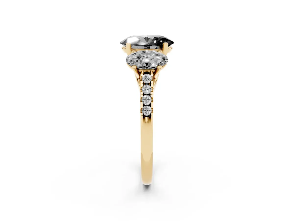 Fancy Black Three-Stone Oval Cut Diamond Ring with Round Pavé Band and Prong Setting Yellow gold
