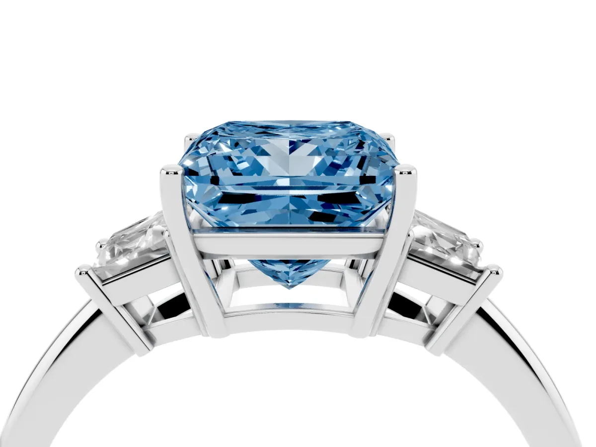 Fancy Blue Princess Cut Diamond Three-Stone Ring with Trapezoid Side Stones and Prong Setting Silver