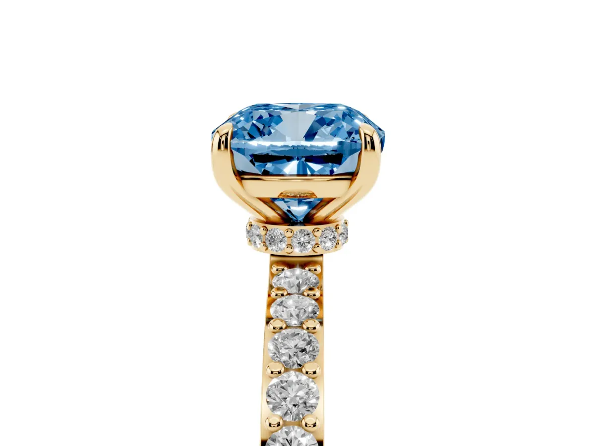 Fancy Blue Cushion Cut Diamond Solitaire Engagement Ring with Pavé Band and Four-Prong Setting Yellow gold
