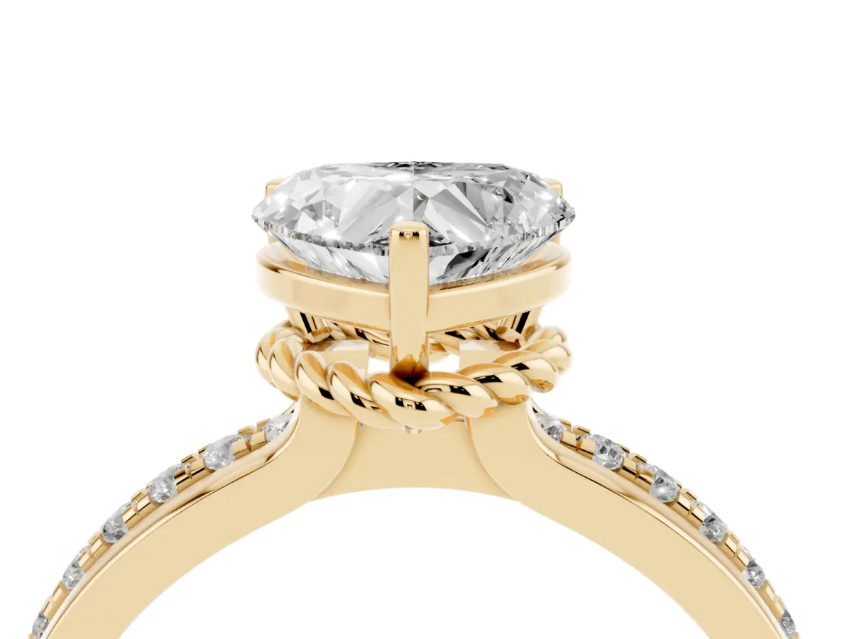 Heart Cut Solitaire Diamond Ring with Channel Set Band and Six-Prong Setting Yellow gold