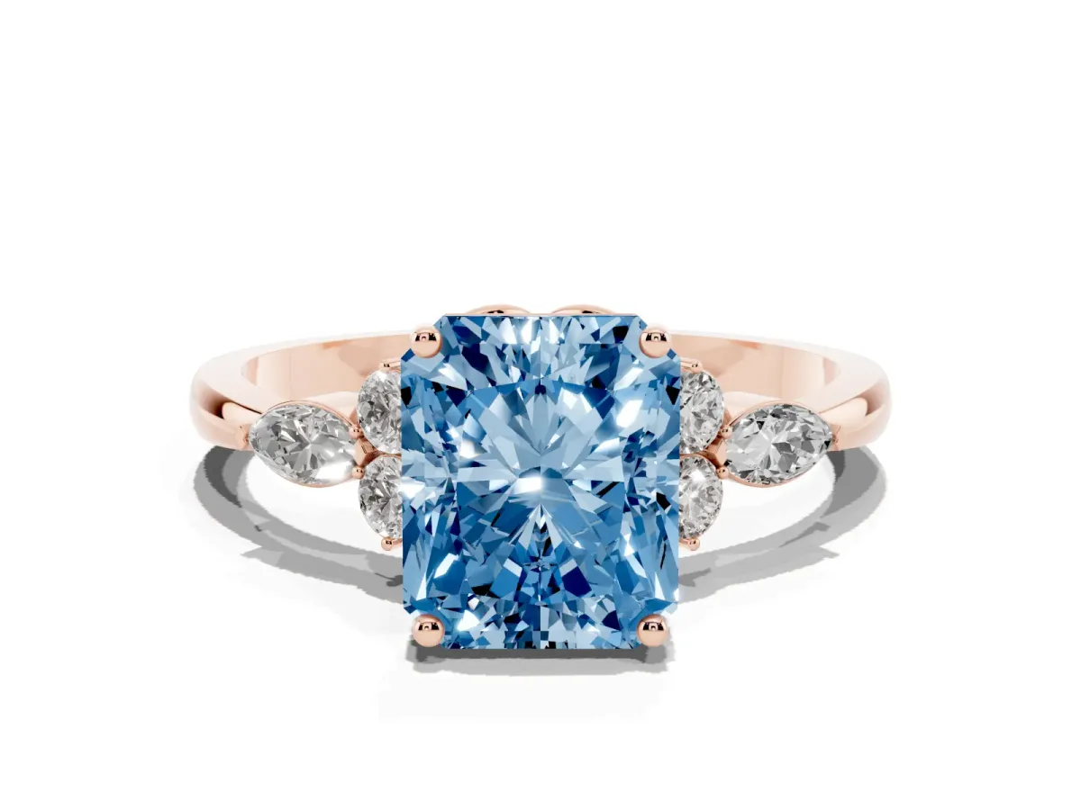 Fancy Blue Radiant Cut Brilliant Diamond Solitaire Ring with Pear Side Stones and Four-Prong Setting Rose gold