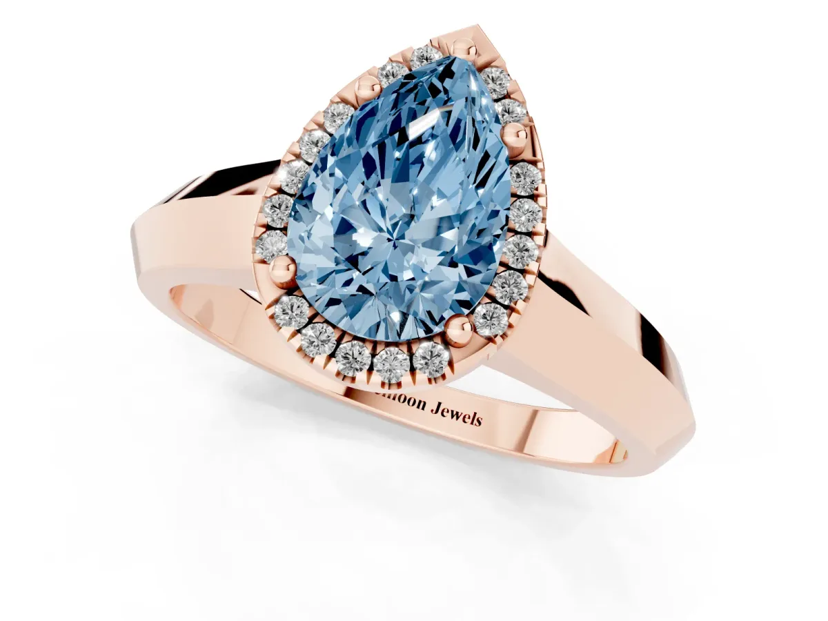 Fancy Blue Pear Cut Halo Diamond Ring with Cathedral Band and Four-Prong Setting Rose gold