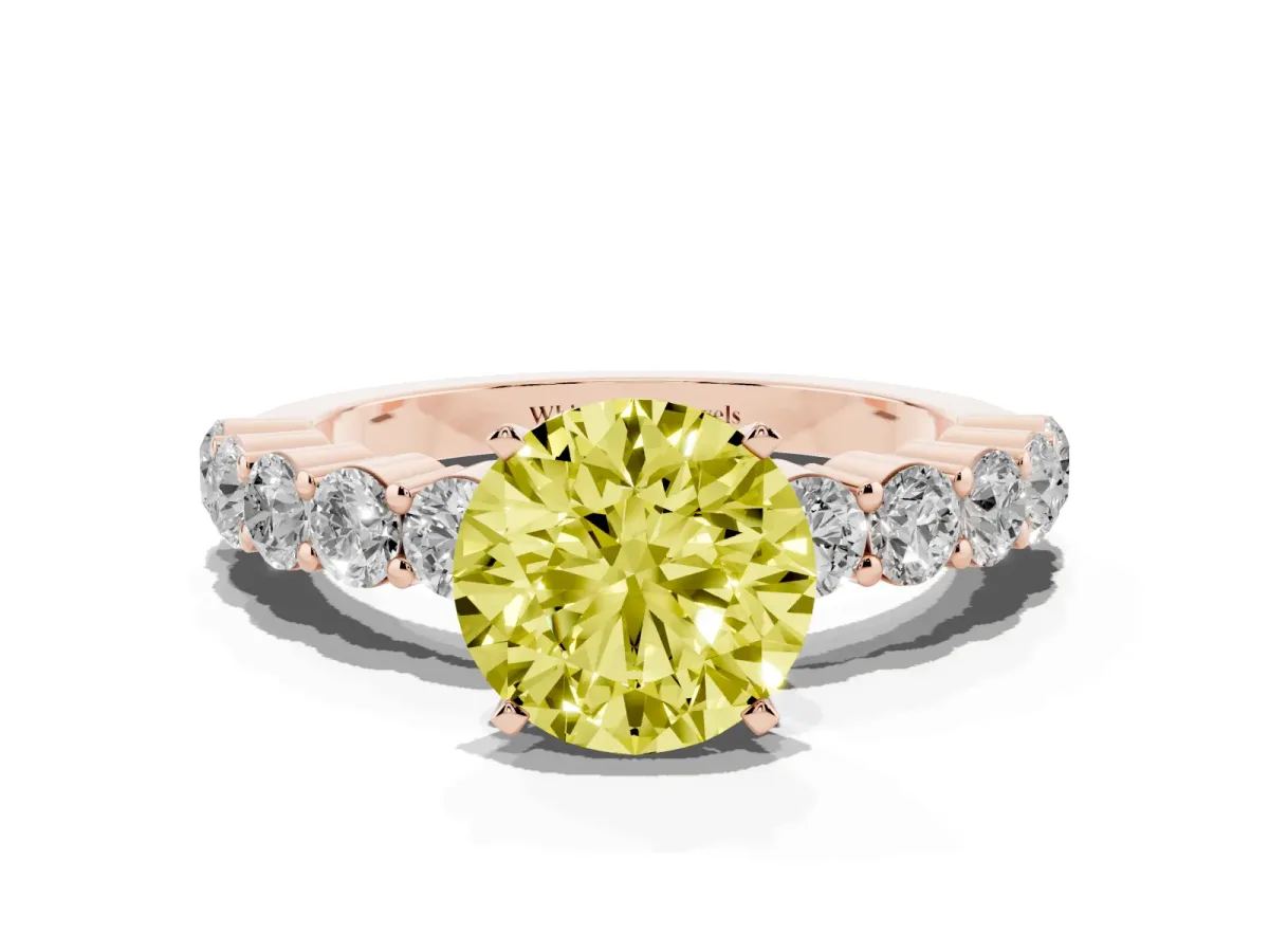 Fancy Yellow Round Cut Diamond Solitaire Ring with Shared Prong Round Side Stones Rose gold
