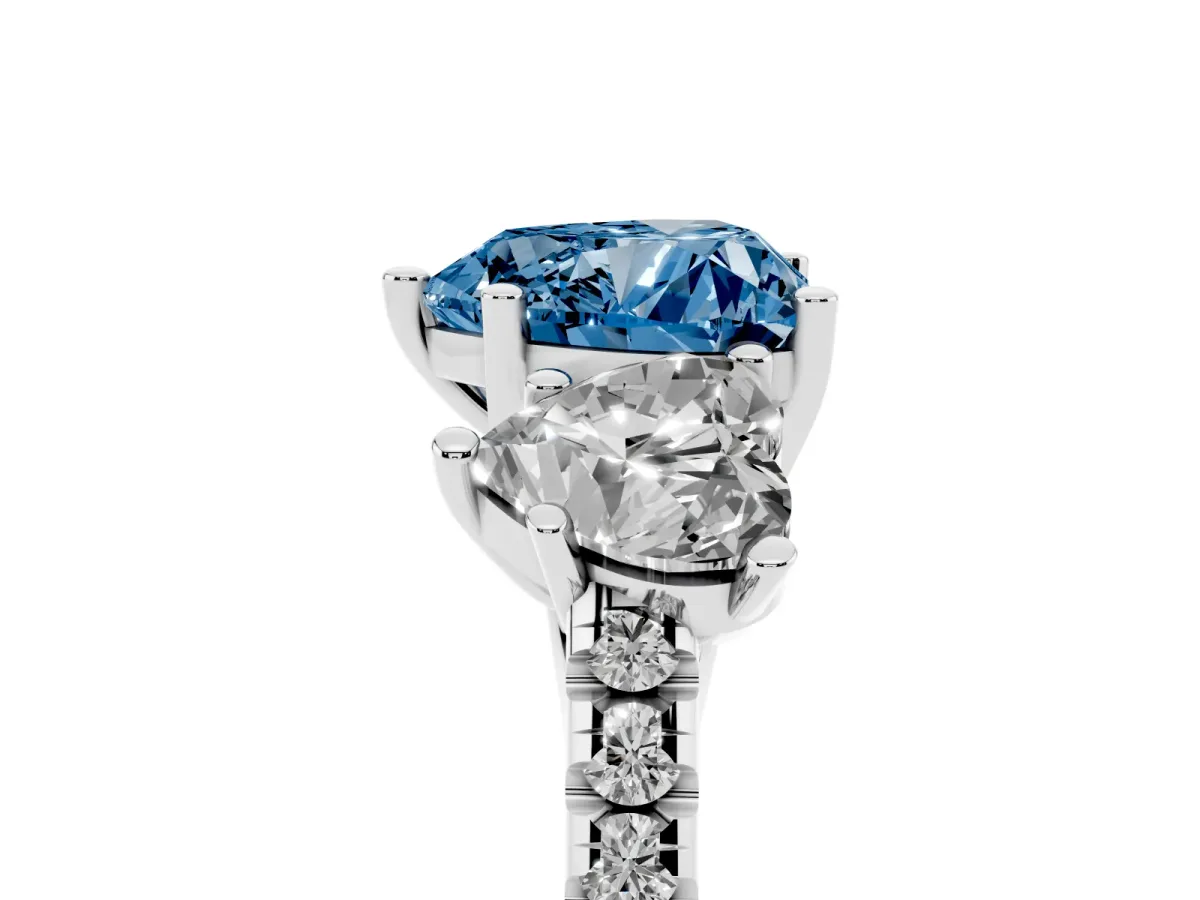 Fancy Blue Three-Stone Heart Cut Diamond Ring with Round Pavé Band and Prong Setting Silver