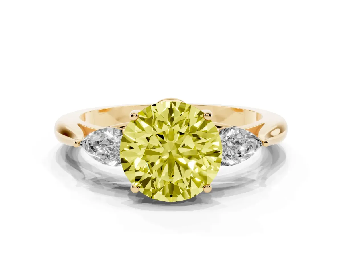 Fancy Yellow Three-Stone Round Cut Diamond Ring with Pear Side Stones in Four-Prong Setting Yellow gold