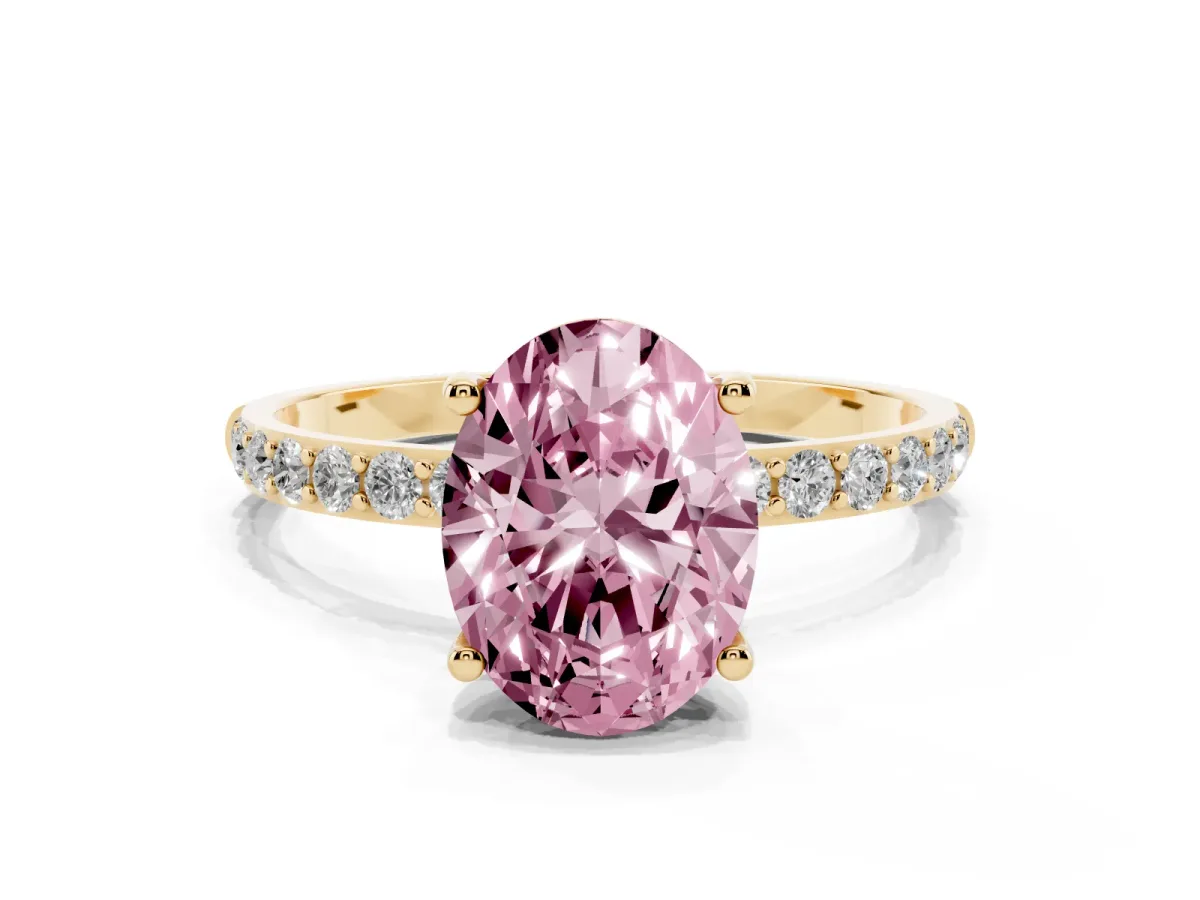 Fancy Pink Oval Cut Diamond Solitaire Ring with Round Pavé Shoulders and Prong Setting Yellow gold