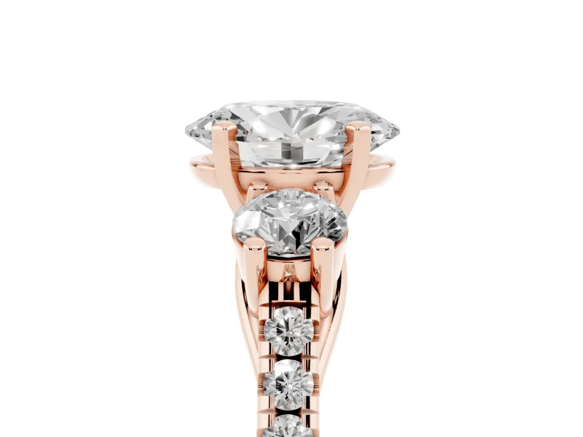 Three-Stone Oval Cut Diamond Pavé Band with Four-Prong Setting Rose gold