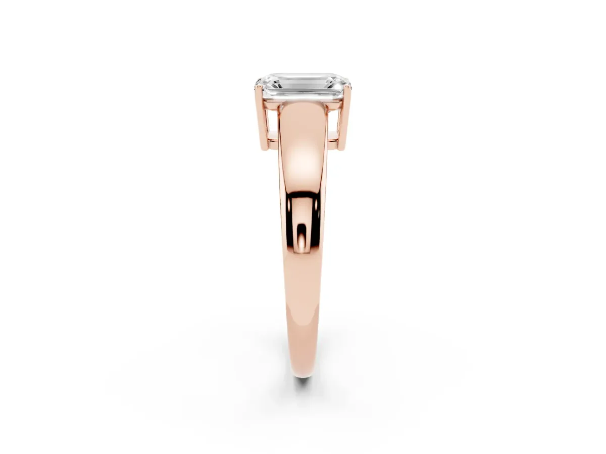 Emerald Cut Solitaire Diamond Ring with Tapered Band and Four-Prong Setting Rose gold