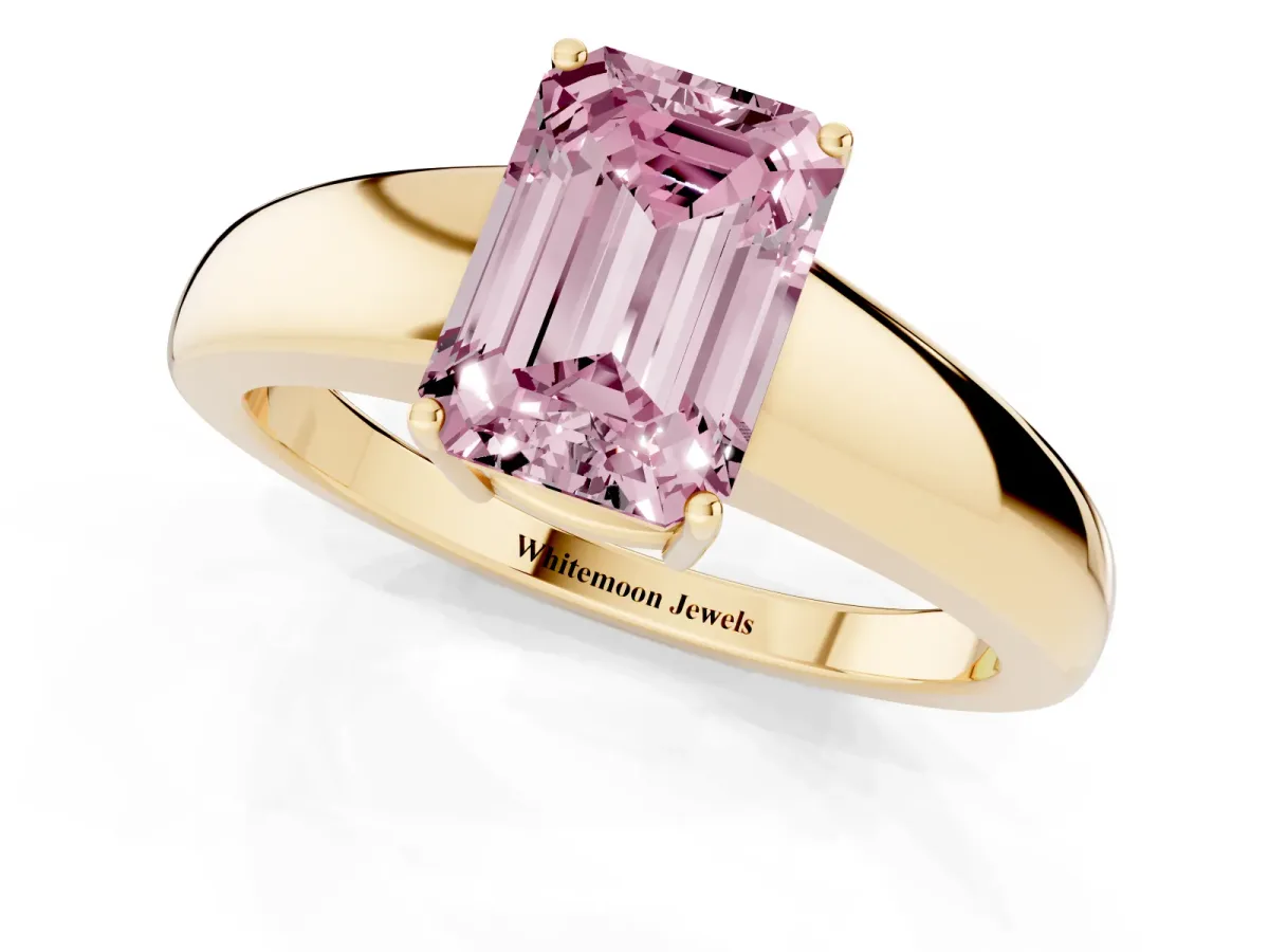 Fancy Pink Emerald Cut Solitaire Diamond Ring with Tapered Band and Four-Prong Setting Yellow gold