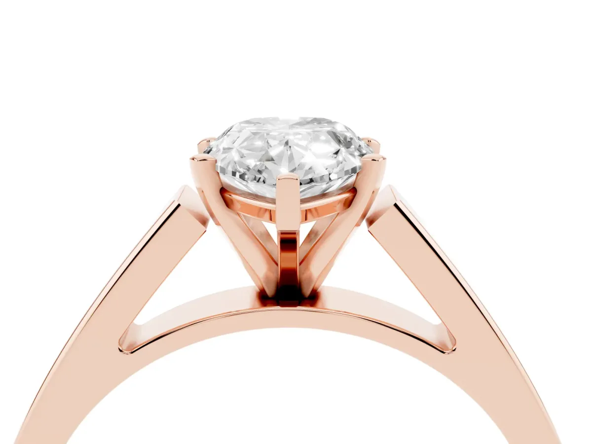 Pear Cut Solitaire Engagement Ring with Four-Prong Setting and Tapered Band Rose gold