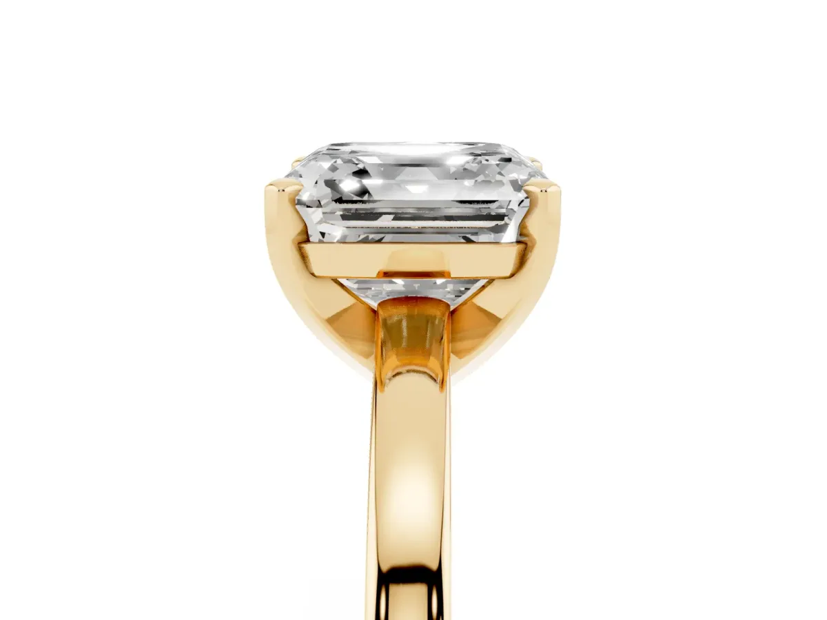 Asscher Cut Solitaire Diamond Engagement Ring with Four-Prong Setting on a Classic Band Yellow gold