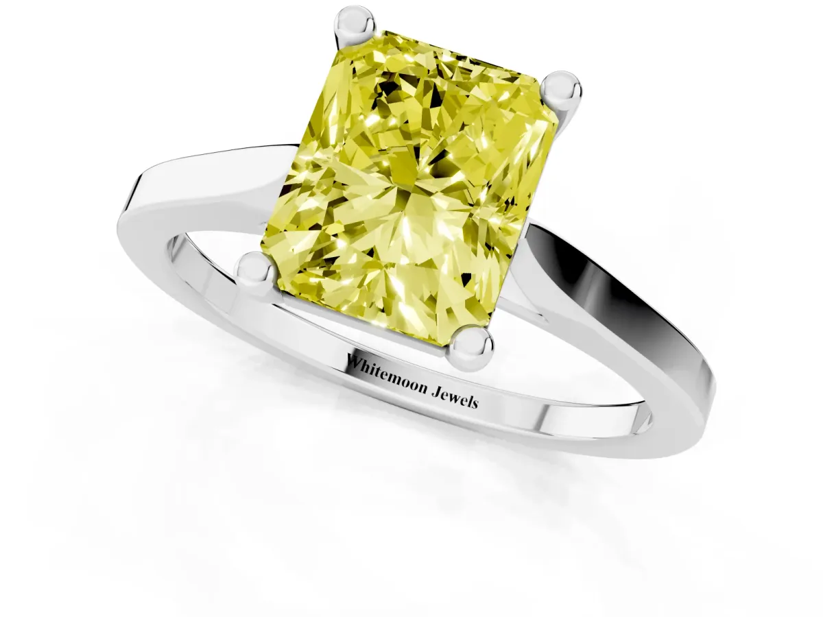 Fancy Yellow Radiant Cut Solitaire Diamond Ring with Four-Prong Setting and Tapered Band Silver