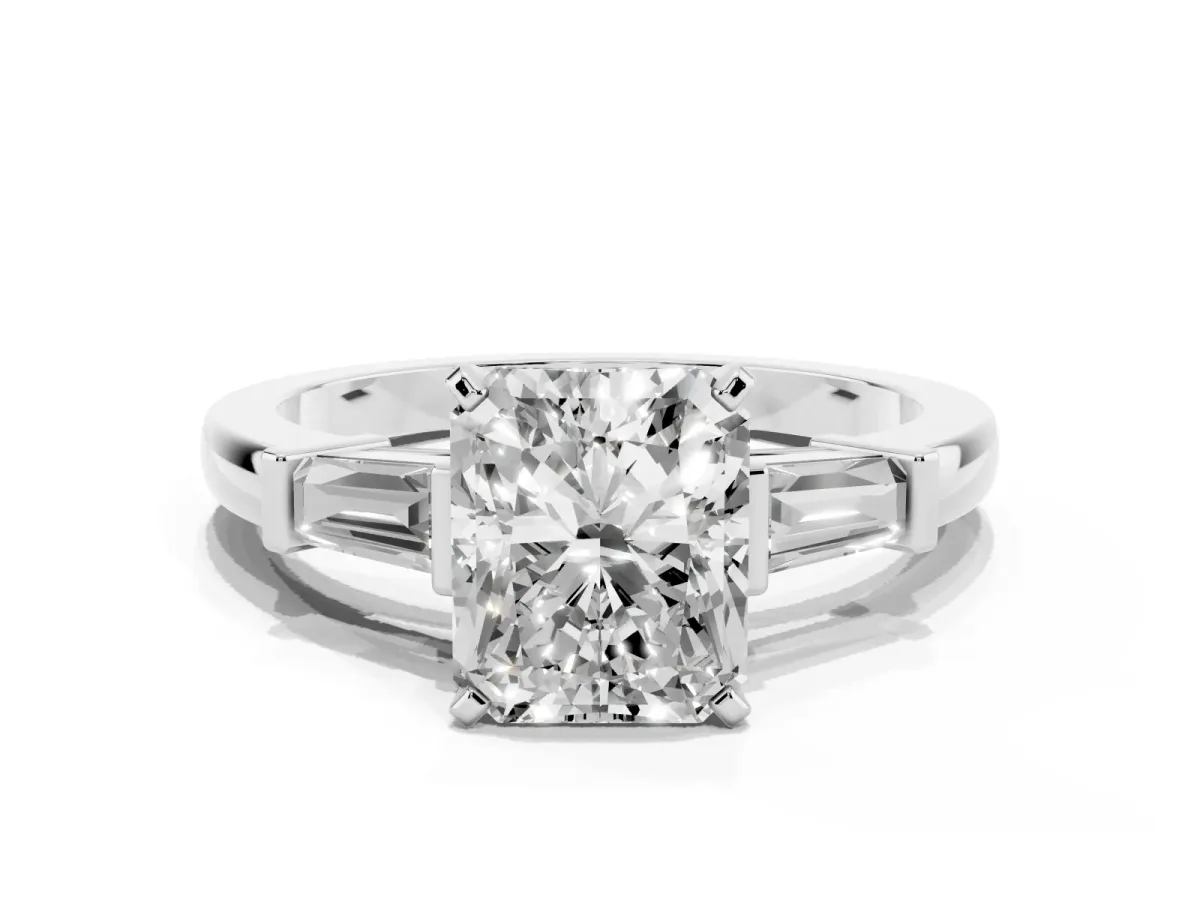 Radiant Cut Cut Diamond Solitaire Ring with Tapered Baguette Accents and Four-Prong Setting Silver