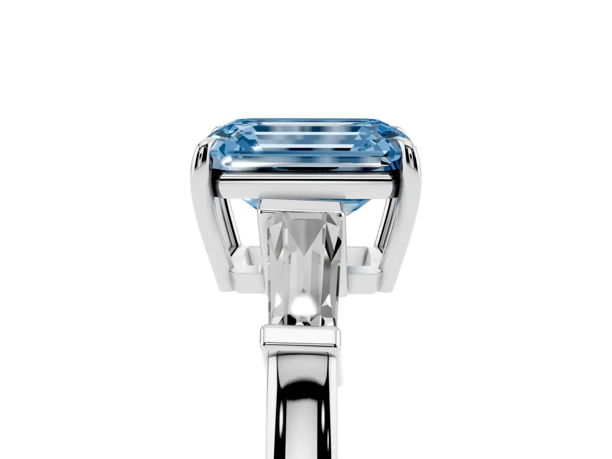 Fancy Blue Emerald Cut Diamond Three-Stone Ring with Tapered Baguette Side Stones and Prong Setting Platinum