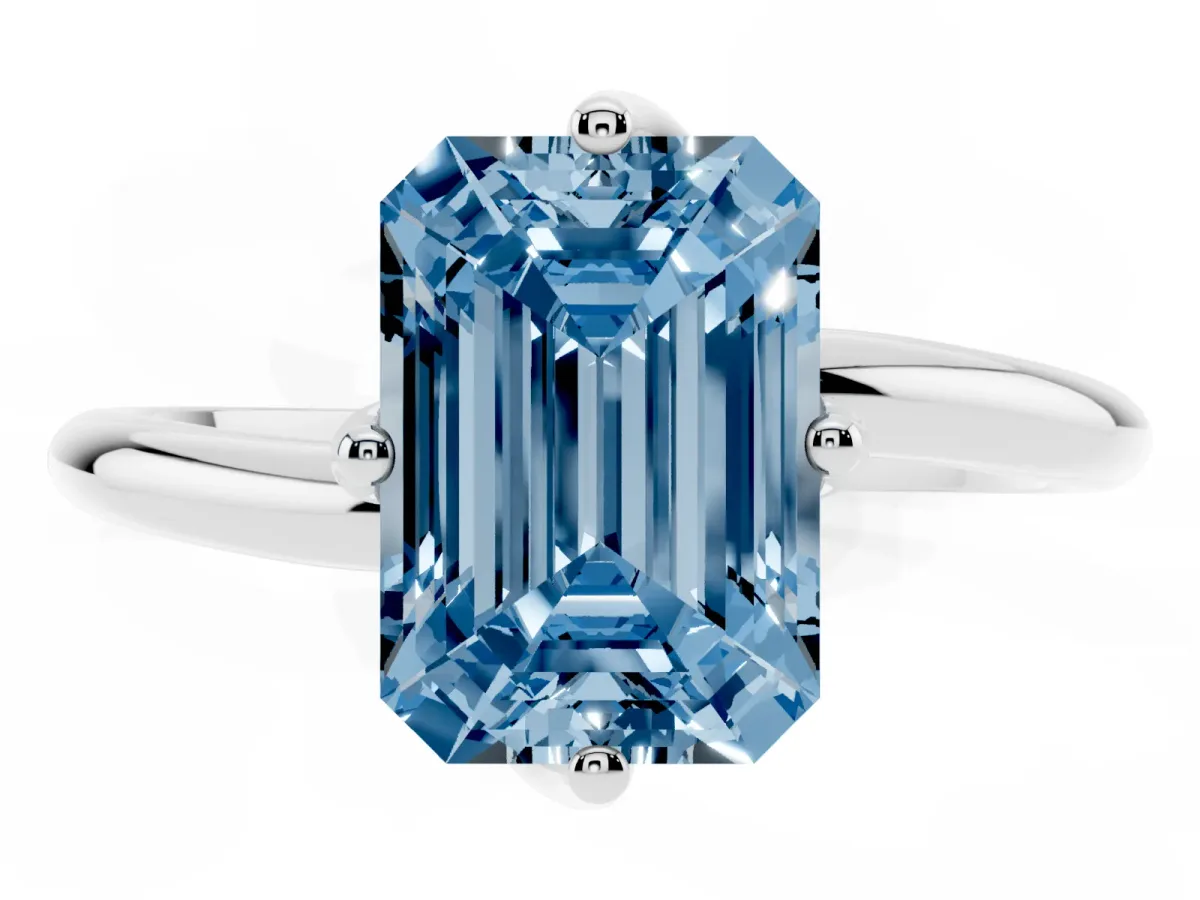 Fancy Blue Emerald Cut Diamond Solitaire Engagement Ring with Four-Prong Setting and Classic Band Silver