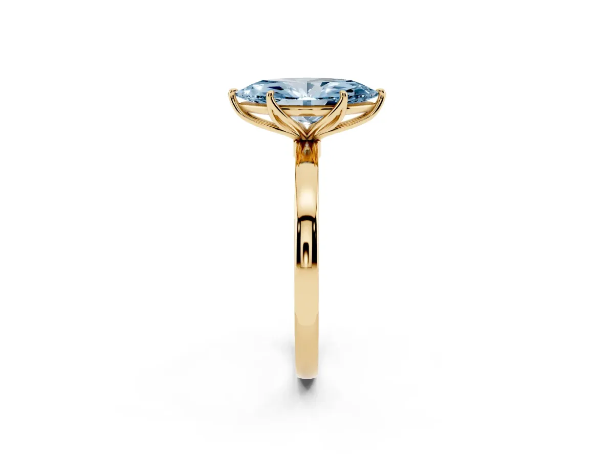 Fancy Blue Marquise Cut Diamond Solitaire Ring with Thin Band and Prong Setting Yellow gold
