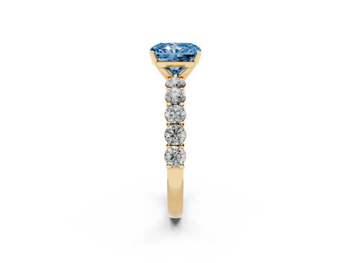 Fancy Blue Radiant Cut Diamond Solitaire Ring with Shared Prong Round Side Stones Yellow gold