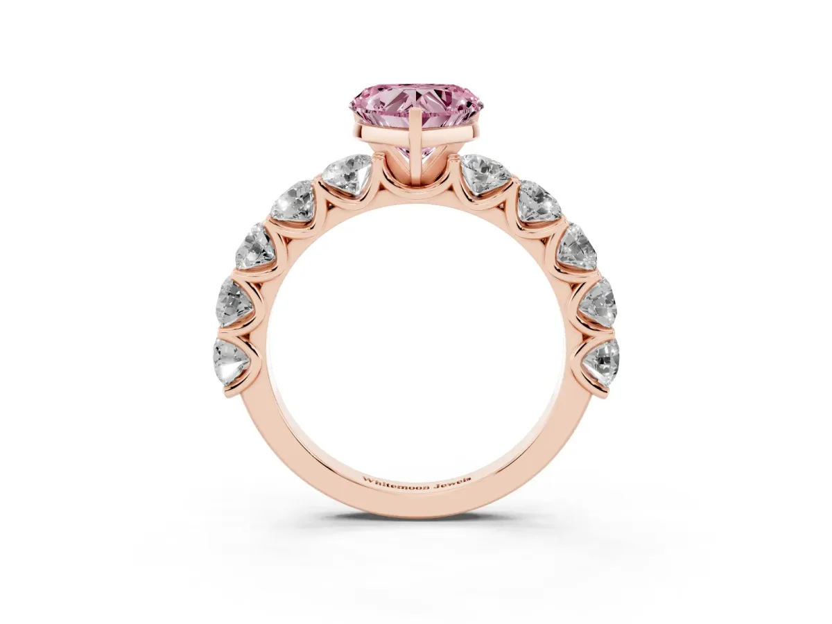 Fancy Pink Heart Cut Diamond Prong Setting with Side Stones on a Pave Band Rose gold