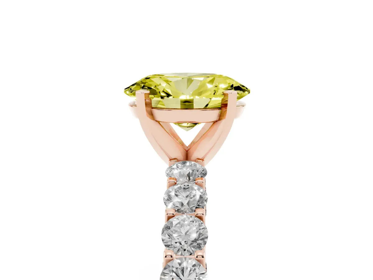 Fancy Yellow Oval Cut Diamond Solitaire Ring with Shared Prong Pavé Band and Four-Prong Setting Rose gold