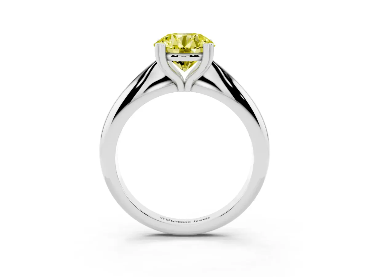 Fancy Yellow Round Cut Cut Solitaire Engagement Ring with Tapered Band and Four-Prong Setting Silver