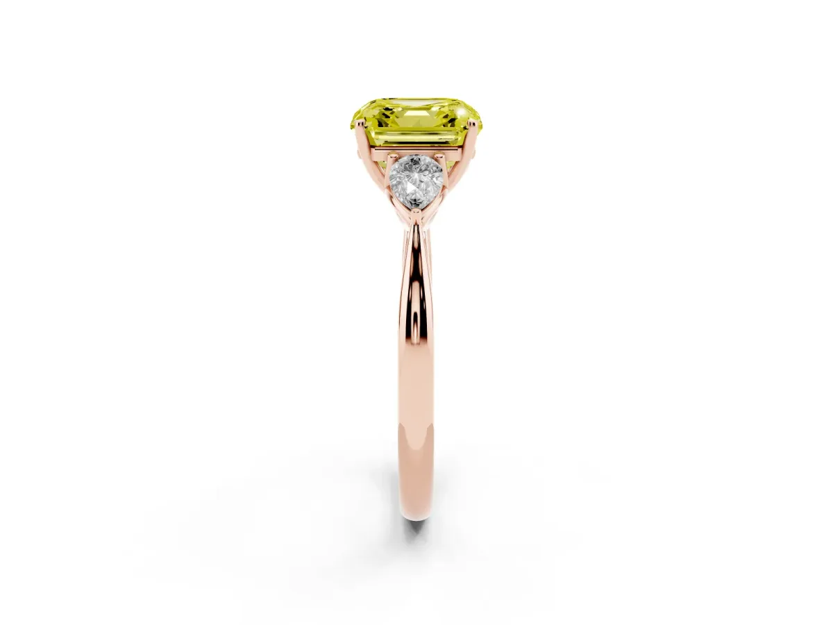 Fancy Yellow Three-Stone Asscher Cut Diamond Ring with Pear Side Stones in Four-Prong Setting Rose gold