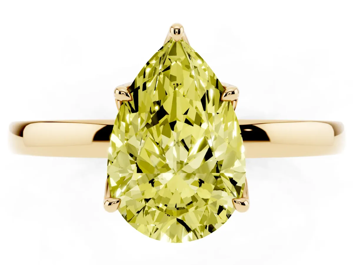 Fancy Yellow Pear Cut Diamond Solitaire Ring with Thin Band and Prong Setting Yellow gold