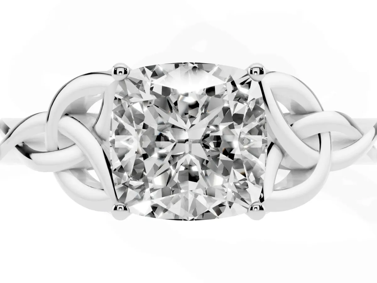 Cushion Cut Diamond Solitaire Engagement Ring with Celtic Knot Band and Four-Prong Setting Platinum