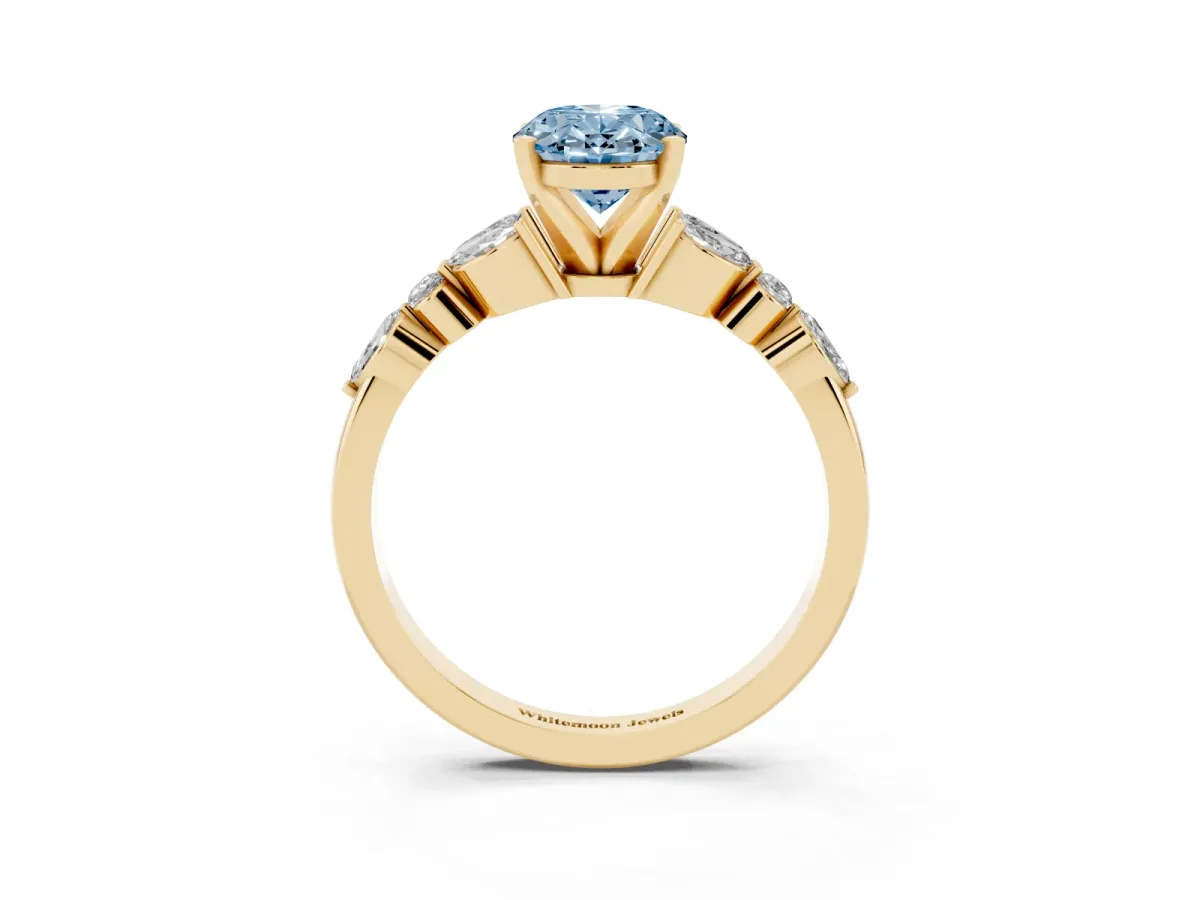 Fancy Blue Oval Cut Diamond Solitaire Ring with Side Stones and Four-Prong Setting Yellow gold