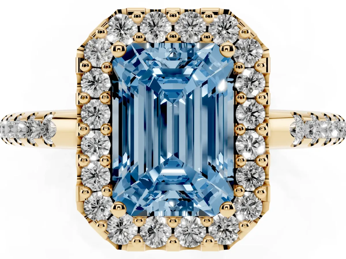 Fancy Blue Emerald Cut Diamond Pavé Halo Ring with Four-Prong Setting Yellow gold